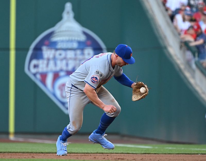 Jul 1, 2024; Washington, District of Columbia, USA; New York Mets first baseman Pete Alonso (20) fields a ground ball for an out against the Washington Nationals during the fourth inning at Nationals Park. Mandatory Credit: Rafael Suanes-USA TODAY Sports