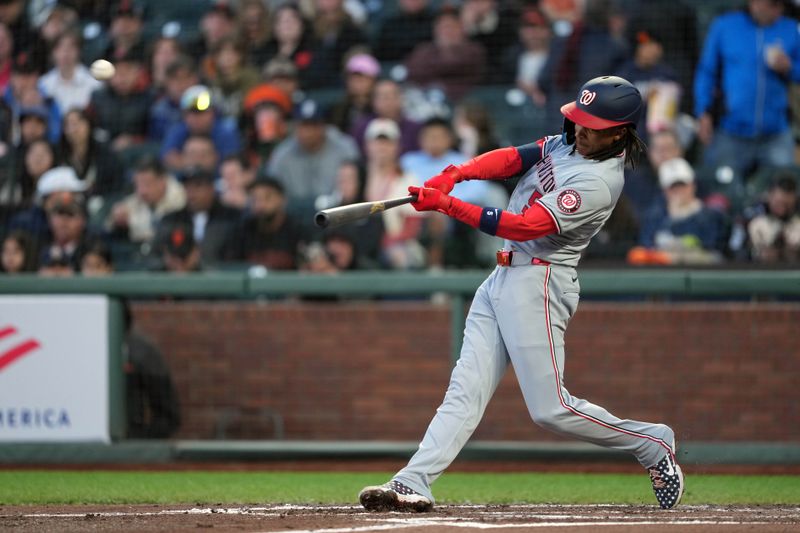 Apr 9, 2024; San Francisco, California, USA; Washington Nationals shortstop CJ Abrams (5) hits a home run against the San Francisco Giants during the third inning at Oracle Park. Mandatory Credit: Darren Yamashita-USA TODAY Sports