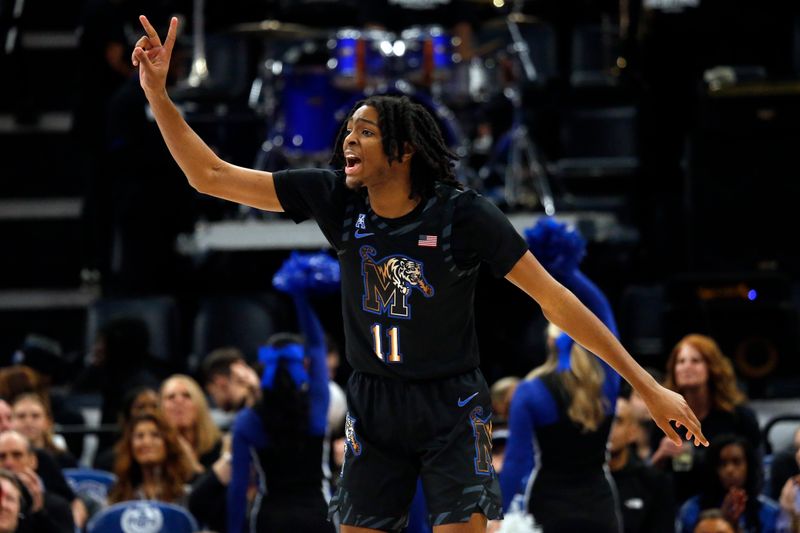 Jan 26, 2023; Memphis, Tennessee, USA; Memphis Tigers guard Johnathan Lawson (11) reacts during the first half against the Southern Methodist Mustangs at FedExForum. Mandatory Credit: Petre Thomas-USA TODAY Sports