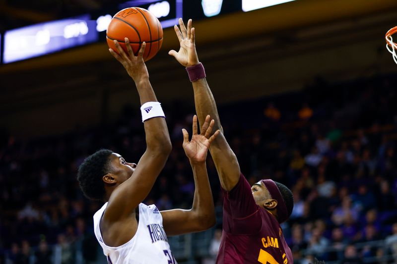 Jan 26, 2023; Seattle, Washington, USA; Washington Huskies guard Noah Williams (24) shoots against Arizona State Sun Devils guard Devan Cambridge (35) during the second half at Alaska Airlines Arena at Hec Edmundson Pavilion. Mandatory Credit: Joe Nicholson-USA TODAY Sports