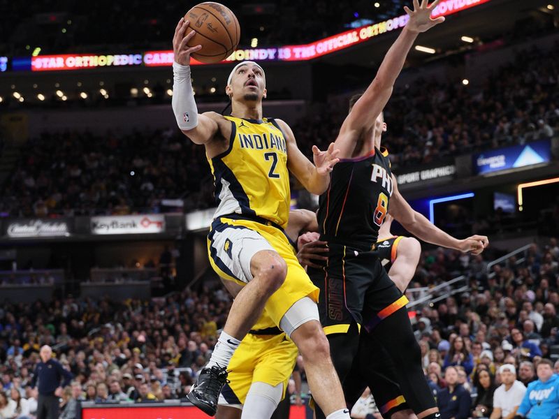 INDIANAPOLIS, INDIANA - JANUARY 26: Andrew Nembhard #2 of the Indiana Pacers shoots the ball while defended by Grayson Allen #8 of the Phoenix Suns in the second half of the Pacers 133-131 win at Gainbridge Fieldhouse on January 26, 2024 in Indianapolis, Indiana.    NOTE TO USER: User expressly acknowledges and agrees that, by downloading and or using this photograph, User is consenting to the terms and conditions of the Getty Images License Agreement.  (Photo by Andy Lyons/Getty Images)