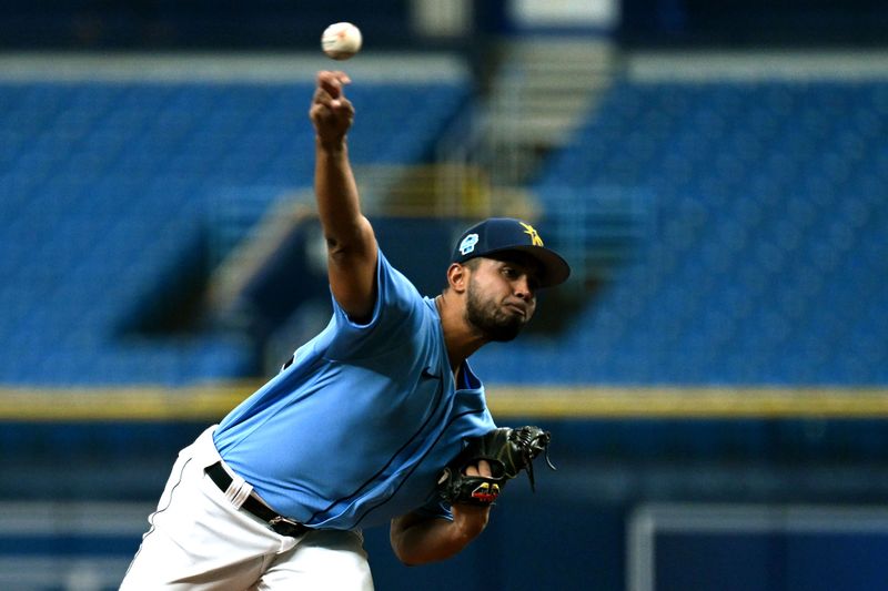 Mar 9, 2023; St. Petersburg, Florida, USA; Tampa Bay Rays pitcher Anthony Molina (94) throws a pitch in the first inning against the Toronto Blue Jays at Tropicana Field. Mandatory Credit: Jonathan Dyer-USA TODAY Sports