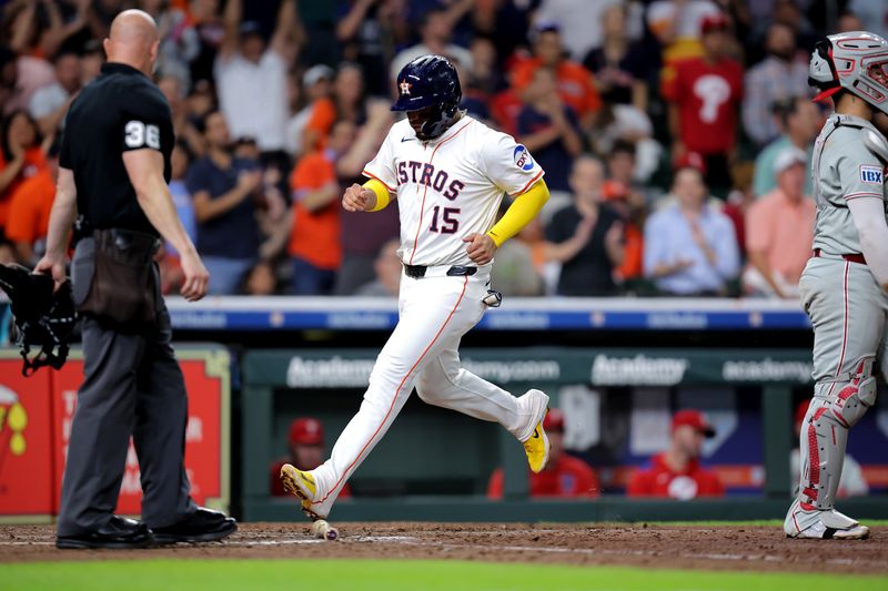 Jun 26, 2025; Houston, Texas, USA; Houston Astros third baseman Isaac Paredes (15) crosses home plate to score a run against the Philadelphia Phillies during the eighth inning at Daikin Park. Mandatory Credit: Erik Williams-Imagn Images