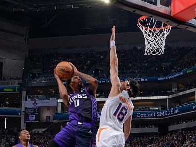 SACRAMENTO, CA - DECEMBER 22:  Malik Monk #0 of the Sacramento Kings goes to the basket during the game on December 22, 2023 at Golden 1 Center in Sacramento, California. NOTE TO USER: User expressly acknowledges and agrees that, by downloading and or using this Photograph, user is consenting to the terms and conditions of the Getty Images License Agreement. Mandatory Copyright Notice: Copyright 2023 NBAE (Photo by Rocky Widner/NBAE via Getty Images)