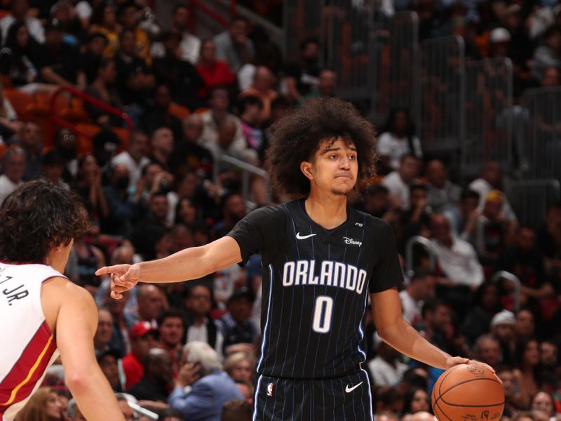 MIAMI, FL - OCTOBER 23: Anthony Black #0 of the Orlando Magic dribbles the ball during the game against the Miami Heat on October 23, 2024 at Kaseya Center in Miami, Florida. NOTE TO USER: User expressly acknowledges and agrees that, by downloading and or using this Photograph, user is consenting to the terms and conditions of the Getty Images License Agreement. Mandatory Copyright Notice: Copyright 2024 NBAE (Photo by Issac Baldizon/NBAE via Getty Images)