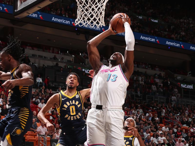 MIAMI, FL - FEBRUARY 28:  Bam Adebayo #13 of the Miami Heat dunks the ball during the game against the Indiana Pacers on February 28, 2025 at Kaseya Center in Miami, Florida. NOTE TO USER: User expressly acknowledges and agrees that, by downloading and or using this Photograph, user is consenting to the terms and conditions of the Getty Images License Agreement. Mandatory Copyright Notice: Copyright 2025 NBAE (Photo by Issac Baldizon/NBAE via Getty Images)