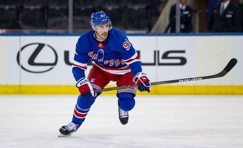 Sep 24, 2024; New York, New York, USA; New York Rangers right wing Reilly Smith (91) skates in his home debut against the New York Islanders during the first period at Madison Square Garden. Mandatory Credit: Danny Wild-Imagn Images