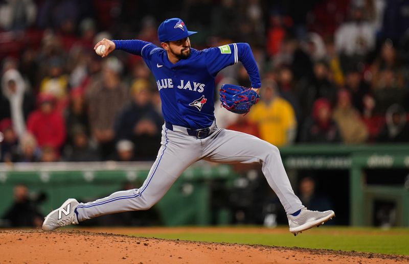 Apr 9, 2025; Boston, Massachusetts, USA; Toronto Blue Jays pitcher Nick Sandlin (52) throws a pitch against the Boston Red Sox in the eleventh  inning at Fenway Park. Mandatory Credit: David Butler II-Imagn Images