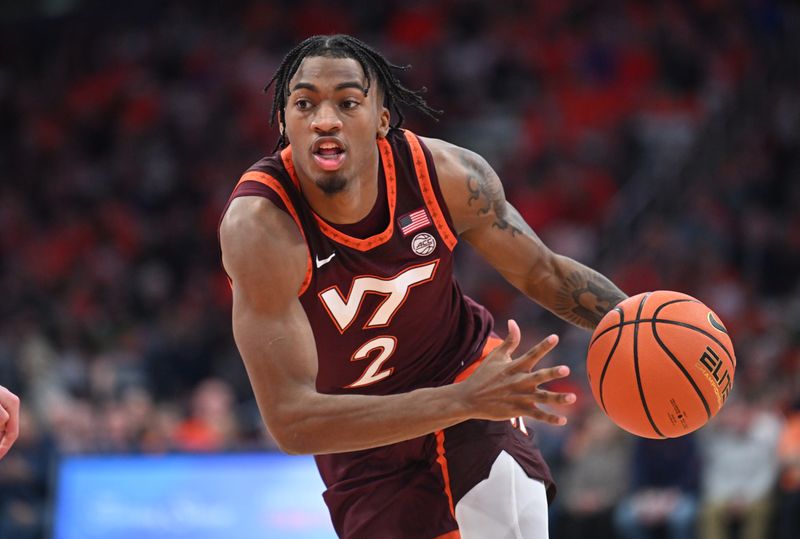 Feb 27, 2024; Syracuse, New York, USA; Virginia Tech Hokies guard MJ Collins (2) handles the ball against the Syracuse Orange in the first half at the JMA Wireless Dome. Mandatory Credit: Mark Konezny-USA TODAY Sports