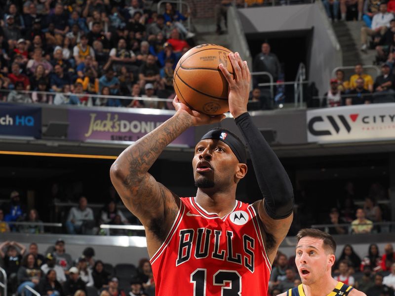 INDIANAPOLIS, IN - MARCH 13:  Torrey Craig #13 of Chicago Bulls shoots a free throw during the game on March 13, 2024 at Gainbridge Fieldhouse in Indianapolis, Indiana. NOTE TO USER: User expressly acknowledges and agrees that, by downloading and or using this Photograph, user is consenting to the terms and conditions of the Getty Images License Agreement. Mandatory Copyright Notice: Copyright 2024 NBAE (Photo by Ron Hoskins/NBAE via Getty Images)