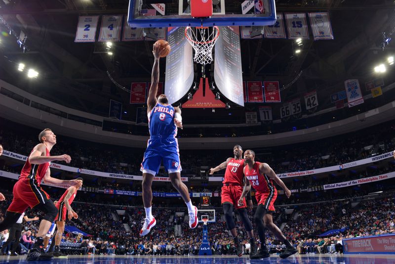 PHILADELPHIA, PA - FEBRUARY 5: Paul George #8 of the Philadelphia 76ers drives to the basket during the game against the Miami Heat on February 5, 2025 at the Wells Fargo Center in Philadelphia, Pennsylvania NOTE TO USER: User expressly acknowledges and agrees that, by downloading and/or using this Photograph, user is consenting to the terms and conditions of the Getty Images License Agreement. Mandatory Copyright Notice: Copyright 2025 NBAE (Photo by Jesse D. Garrabrant/NBAE via Getty Images)