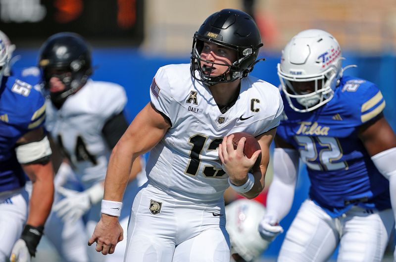 Oct 5, 2024; Tulsa, Oklahoma, USA; Army Black Knights quarterback Bryson Daily (13) carries the ball against the Tulsa Golden Hurricane during the first half at Skelly Field at H.A. Chapman Stadium. Mandatory Credit: Danny Wild-Imagn Images