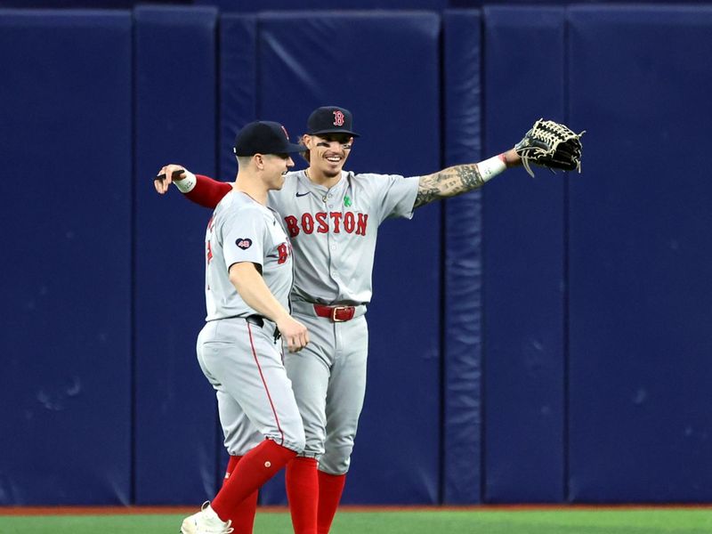 May 20, 2024; St. Petersburg, Florida, USA;  Boston Red Sox outfielder Tyler O'Neill (17), outfielder Jarren Duran (16) celebrate after they beat the Tampa Bay Rays at Tropicana Field. Mandatory Credit: Kim Klement Neitzel-USA TODAY Sports