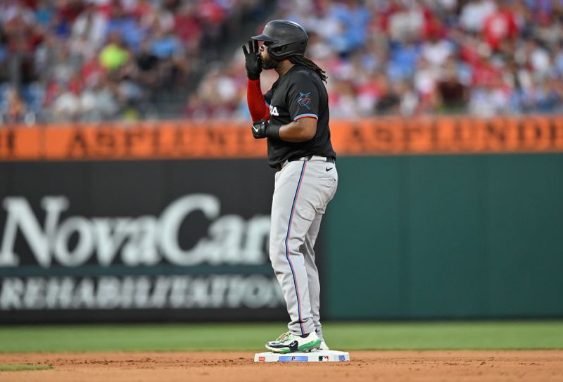 Jun 27, 2024; Philadelphia, Pennsylvania, USA; Miami Marlins first baseman Josh Bell (9) reacts after hitting an RBI double against the Philadelphia Phillies in the seventh inning at Citizens Bank Park. Mandatory Credit: Kyle Ross-USA TODAY Sports