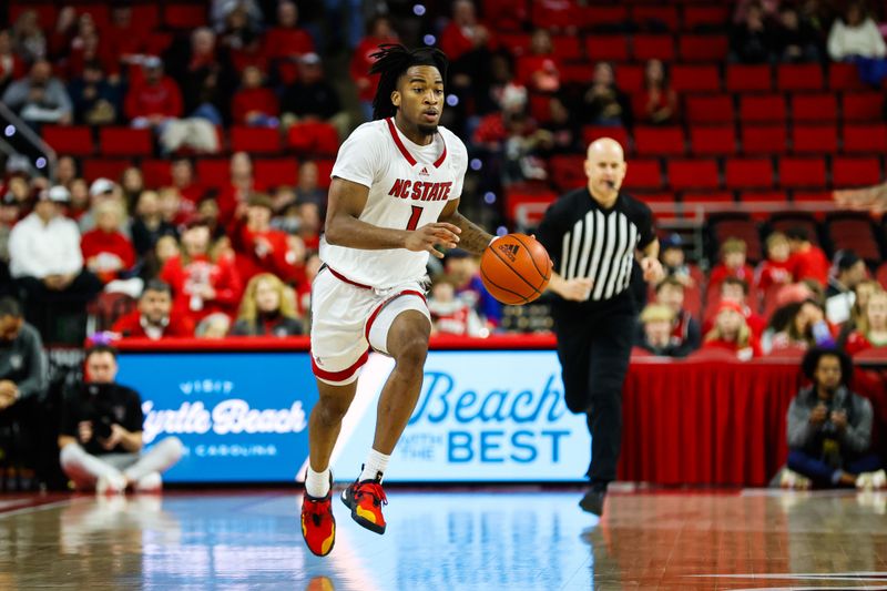 Dec 20, 2023; Raleigh, North Carolina, USA; North Carolina State Wolfpack guard Jayden Taylor (1) dribbles with the ball during the first half against Saint Louis at PNC Arena. Mandatory Credit: Jaylynn Nash-USA TODAY Sports