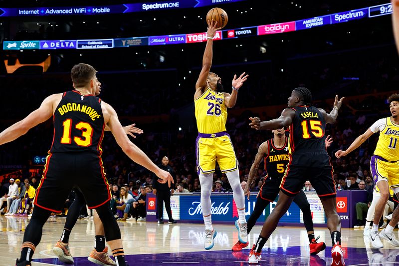 LOS ANGELES, CALIFORNIA - MARCH 18:  Spencer Dinwiddie #26 of the Los Angeles Lakers takes a shot against the Atlanta Hawks in the second half at Crypto.com Arena on March 18, 2024 in Los Angeles, California.  NOTE TO USER: User expressly acknowledges and agrees that, by downloading and/or using this photograph, user is consenting to the terms and conditions of the Getty Images License Agreement.  (Photo by Ronald Martinez/Getty Images)