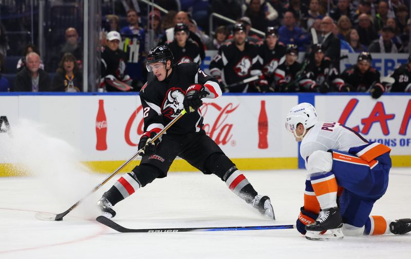 Nov 1, 2024; Buffalo, New York, USA;  New York Islanders defenseman Ryan Pulock (6) looks to block a pass by Buffalo Sabres center Tage Thompson (72) during the second period at KeyBank Center. Mandatory Credit: Timothy T. Ludwig-Imagn Images