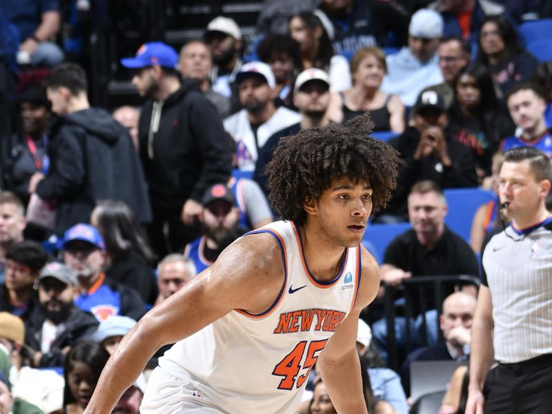 ORLANDO, FL - FEBRUARY 14: Jericho Sims #45 of the New York Knicks plays defense during the game against the Orlando Magic on February 14, 2024 at the Kia Center in Orlando, Florida. NOTE TO USER: User expressly acknowledges and agrees that, by downloading and or using this photograph, User is consenting to the terms and conditions of the Getty Images License Agreement. Mandatory Copyright Notice: Copyright 2024 NBAE (Photo by Fernando Medina/NBAE via Getty Images)