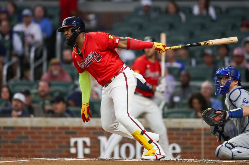 Sep 13, 2024; Atlanta, Georgia, USA; Atlanta Braves designated hitter Marcell Ozuna (20) hits a single against the Los Angeles Dodgers in the first inning at Truist Park. Mandatory Credit: Brett Davis-Imagn Images
