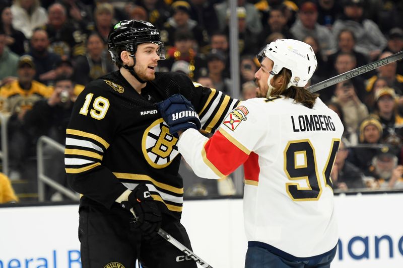 Apr 6, 2024; Boston, Massachusetts, USA; Boston Bruins center John Beecher (19) and Florida Panthers left wing Ryan Lomberg (94) grab each others jerseys during the first period at TD Garden. Mandatory Credit: Bob DeChiara-USA TODAY Sports