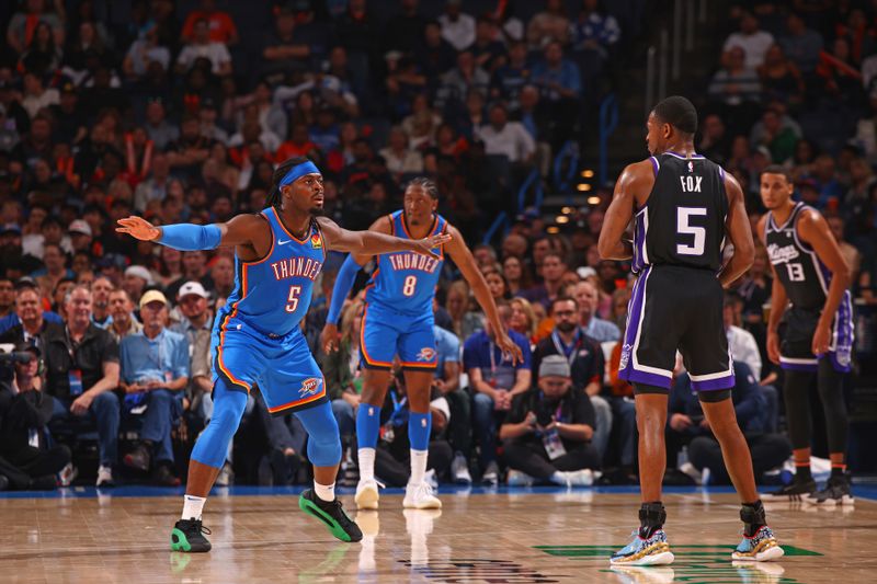 OKLAHOMA CITY, OK - APRIL 9:  Luguentz Dort #5 of the Oklahoma City Thunder plays defense during the game against the Sacramento Kings on April 9, 2024 at Paycom Arena in Oklahoma City, Oklahoma. NOTE TO USER: User expressly acknowledges and agrees that, by downloading and or using this photograph, User is consenting to the terms and conditions of the Getty Images License Agreement. Mandatory Copyright Notice: Copyright 2024 NBAE (Photo by Zach Beeker/NBAE via Getty Images)