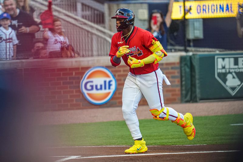 May 23, 2025; Cumberland, Georgia, USA; Atlanta Braves right fielder Ronald Acuna Jr (13) reacts after hitting a lead off home run  against the San Diego Padres during the first inning at Truist Park. Mandatory Credit: Dale Zanine-Imagn Images