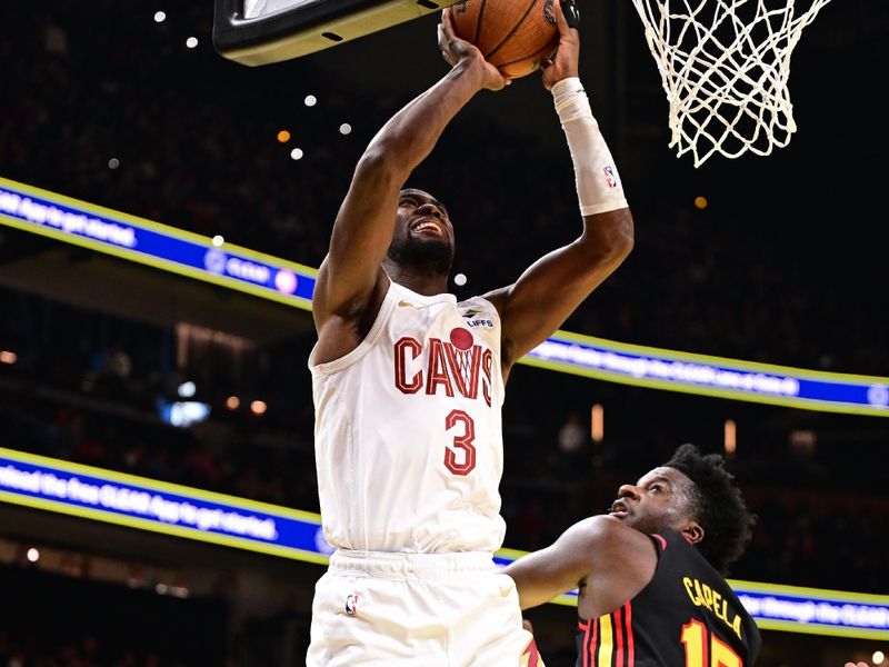 ATLANTA, GA - NOVEMBER 29: Caris LeVert #3 of the Cleveland Cavaliers drives to the basket during the game against the Atlanta Hawks during the Emirates NBA Cup game on November 29, 2024 at State Farm Arena in Atlanta, Georgia.  NOTE TO USER: User expressly acknowledges and agrees that, by downloading and/or using this Photograph, user is consenting to the terms and conditions of the Getty Images License Agreement. Mandatory Copyright Notice: Copyright 2024 NBAE (Photo by Adam Hagy/NBAE via Getty Images)