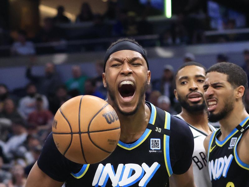 INDIANAPOLIS, INDIANA - MARCH 16: Myles Turner #33 of the Indiana Pacers reacts after a dunk during the second half in the game against the Brooklyn Nets at Gainbridge Fieldhouse on March 16, 2024 in Indianapolis, Indiana. NOTE TO USER: User expressly acknowledges and agrees that, by downloading and or using this photograph, User is consenting to the terms and conditions of the Getty Images License Agreement. (Photo by Justin Casterline/Getty Images)