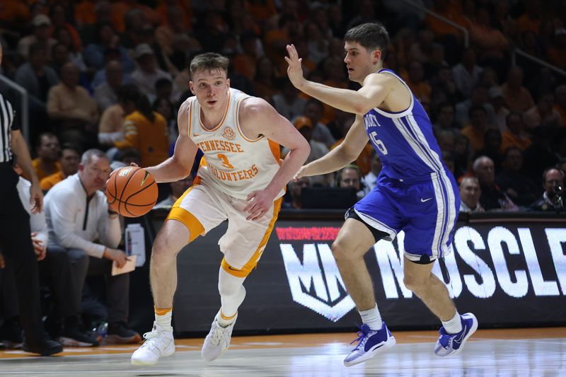 Mar 9, 2024; Knoxville, Tennessee, USA; Tennessee Volunteers guard Dalton Knecht (3) moves the ball against Kentucky Wildcats guard Reed Sheppard (15) during the second half at Thompson-Boling Arena at Food City Center. Mandatory Credit: Randy Sartin-USA TODAY Sports