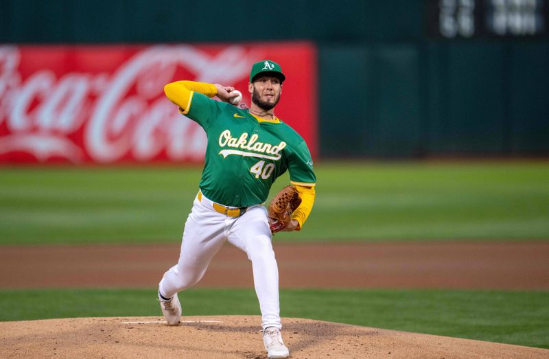 Sep 24, 2024; Oakland, California, USA; Oakland Athletics starting pitcher Mitch Spence (40) pitches against the Texas Rangers during the first inning at Oakland-Alameda County Coliseum. Mandatory Credit: Neville E. Guard-Imagn Images