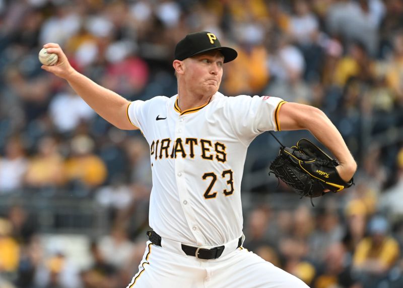 Aug 3, 2024; Pittsburgh, Pennsylvania, USA;  Pittsburgh Pirates starting pitcher Mitch Keller (23) throws against the Arizona Diamondbacks in the first inning at PNC Park. Mandatory Credit: Philip G. Pavely-USA TODAY Sports