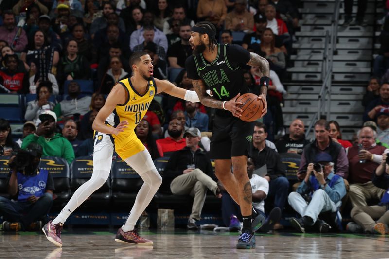 NEW ORLEANS, LA - MARCH 1:  Tyrese Haliburton #0 of the Indiana Pacers plays defense against Brandon Ingram #14 of the New Orleans Pelicans on March 1, 2024 at the Smoothie King Center in New Orleans, Louisiana. NOTE TO USER: User expressly acknowledges and agrees that, by downloading and or using this Photograph, user is consenting to the terms and conditions of the Getty Images License Agreement. Mandatory Copyright Notice: Copyright 2024 NBAE (Photo by Layne Murdoch Jr./NBAE via Getty Images)