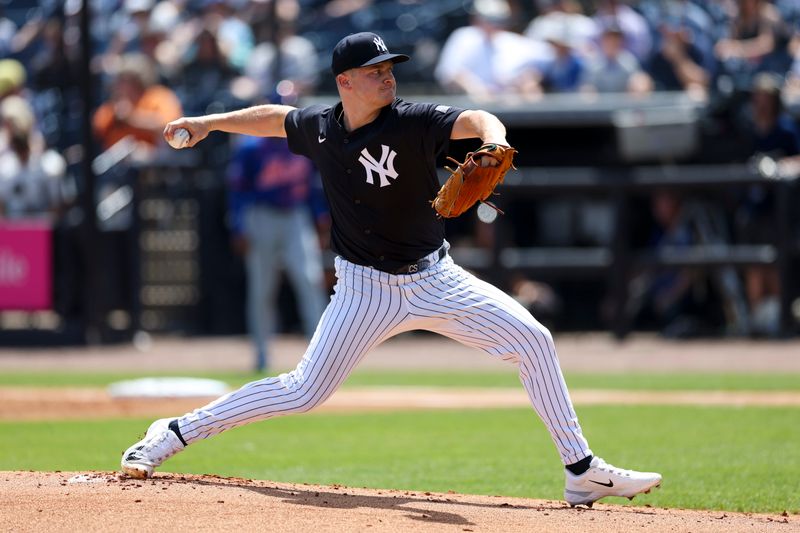 Mar 25, 2024; Tampa, Florida, USA;  New York Yankees starting pitcher Clarke Schmidt (36) throws a pitch against the New York Mets in the first inning at George M. Steinbrenner Field. Mandatory Credit: Nathan Ray Seebeck-USA TODAY Sports