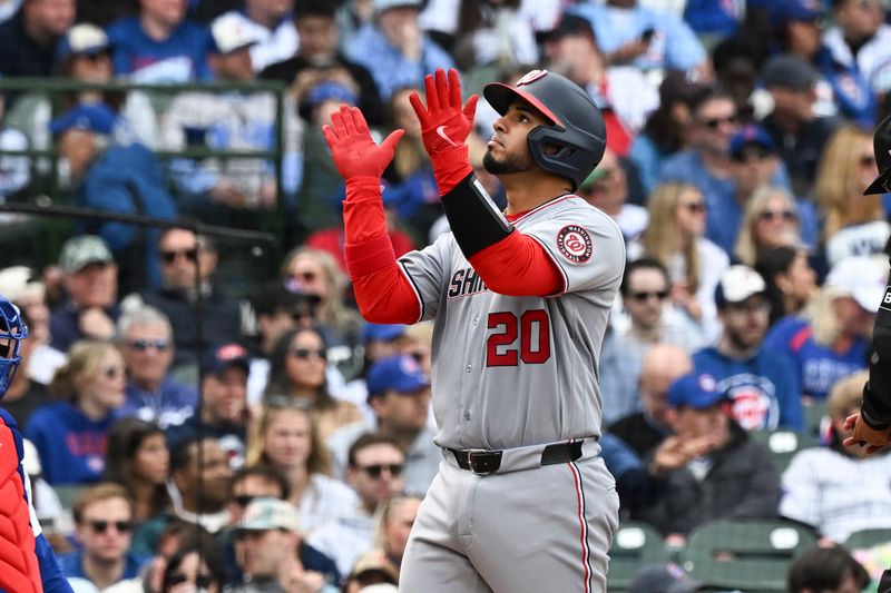 Mar 29, 2026; Chicago, Illinois, USA;  Washington Nationals catcher Keibert Ruiz (20) points after hitting a two-run home run against the Chicago Cubs during the eighth inning at Wrigley Field. Mandatory Credit: Matt Marton-Imagn Images