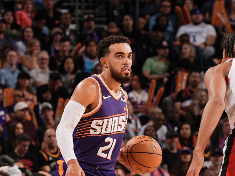 PHOENIX, AZ - NOVEMBER 2: Tyus Jones #21 of the Phoenix Suns handles the ball during the game against the Portland Trail Blazers on November 2, 2024 at Footprint Center in Phoenix, Arizona. NOTE TO USER: User expressly acknowledges and agrees that, by downloading and or using this photograph, user is consenting to the terms and conditions of the Getty Images License Agreement. Mandatory Copyright Notice: Copyright 2024 NBAE (Photo by Kate Frese/NBAE via Getty Images)