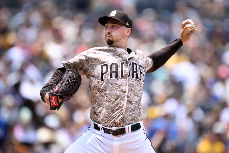 Jul 30, 2023; San Diego, California, USA; San Diego Padres starting pitcher Blake Snell (4) throws a pitch against the Texas Rangers during the first inning at Petco Park. Mandatory Credit: Orlando Ramirez-USA TODAY Sports