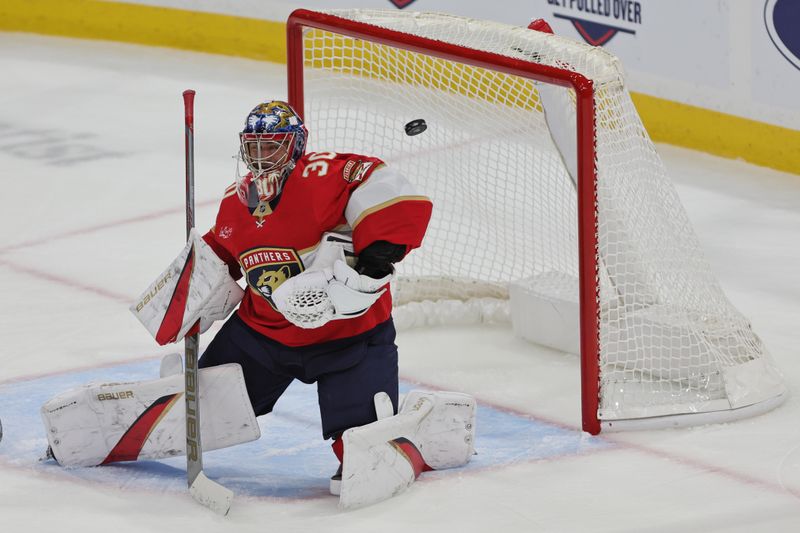 Oct 22, 2024; Sunrise, Florida, USA; Florida Panthers goaltender Spencer Knight (30) makes a save against the Minnesota Wild during the third period at Amerant Bank Arena. Mandatory Credit: Sam Navarro-Imagn Images
