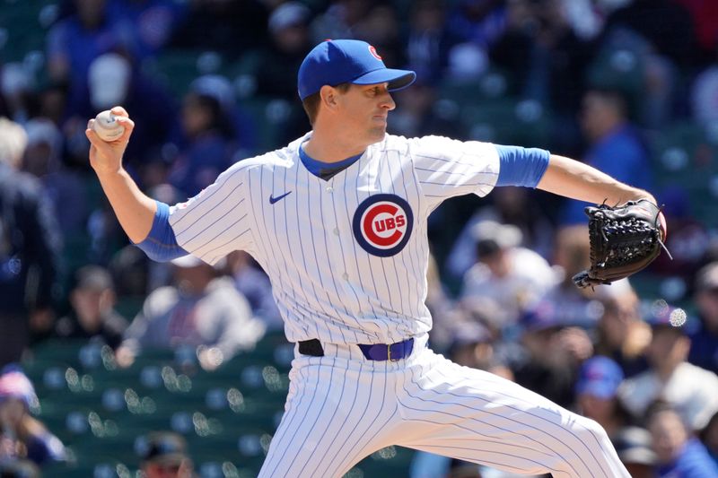 Apr 21, 2024; Chicago, Illinois, USA; Chicago Cubs pitcher Kyle Hendricks (28) throws the ball against the Miami Marlins during the first inning at Wrigley Field. Mandatory Credit: David Banks-USA TODAY Sports