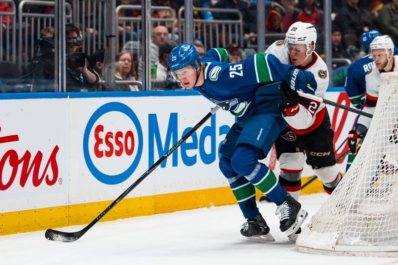 Mar 9, 2026; Vancouver, British Columbia, CAN; Ottawa Senators forward Fabian Zetterlund (20) battles with Vancouver Canucks defenseman Elias Pettersson (25) in the second period at Rogers Arena. Mandatory Credit: Bob Frid-Imagn Images