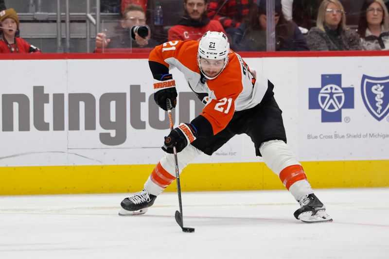 Jan 25, 2024; Detroit, Michigan, USA;  Philadelphia Flyers center Scott Laughton (21) skates with the puck in the third period against the Detroit Red Wings at Little Caesars Arena. Mandatory Credit: Rick Osentoski-USA TODAY Sports