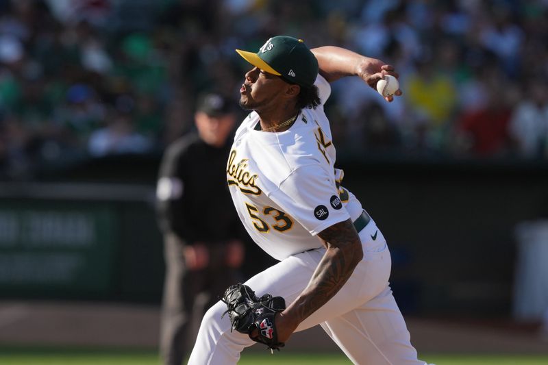 Aug 5, 2023; Oakland, California, USA; Oakland Athletics relief pitcher Angel Felipe (53) throws a pitch against the San Francisco Giants during the eighth inning at Oakland-Alameda County Coliseum. Mandatory Credit: Darren Yamashita-USA TODAY Sports