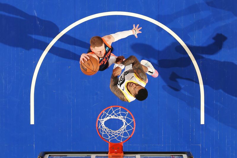 NEW YORK, NY - JANUARY 30: Donte Divincenzo #0 of the New York Knicks drives to the basket during the game against the Utah Jazz on January 30, 2024 at Madison Square Garden in New York City, New York.  NOTE TO USER: User expressly acknowledges and agrees that, by downloading and or using this photograph, User is consenting to the terms and conditions of the Getty Images License Agreement. Mandatory Copyright Notice: Copyright 2024 NBAE  (Photo by Nathaniel S. Butler/NBAE via Getty Images)