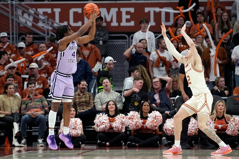 Feb 19, 2024; Austin, Texas, USA; Kansas State Wildcats guard Dai Dai Ames (4) shoots over Texas Longhorns guard Chendall Weaver (2) during the first half at Moody Center. Mandatory Credit: Scott Wachter-USA TODAY Sports