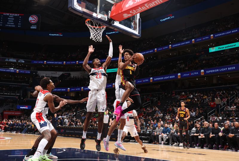 WASHINGTON, DC -? OCTOBER 30: Jalen Johnson #1 of the Atlanta Hawks looks to pass the ball during the game against the Washington Wizards  during a regular season game on October 30, 2024 at Capital One Arena in Washington, DC. NOTE TO USER: User expressly acknowledges and agrees that, by downloading and or using this Photograph, user is consenting to the terms and conditions of the Getty Images License Agreement. Mandatory Copyright Notice: Copyright 2024 NBAE (Photo by Kenny Giarla/NBAE via Getty Images)