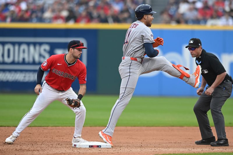 Jun 8, 2025; Cleveland, Ohio, USA; Houston Astros right fielder Cam Smith (11) celebrates after hitting an RBI double during the seventh inning against the Cleveland Guardians at Progressive Field. Mandatory Credit: Ken Blaze-Imagn Images
