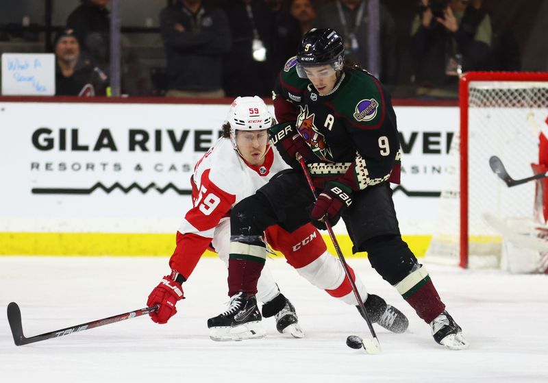 Jan 17, 2023; Tempe, Arizona, USA; Arizona Coyotes right wing Clayton Keller (9) against Detroit Red Wings left wing Tyler Bertuzzi (59) in the third period at Mullett Arena. Mandatory Credit: Mark J. Rebilas-USA TODAY Sports