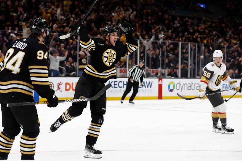 Feb 29, 2024; Boston, Massachusetts, USA; Boston Bruins center Jesper Boqvist (70) celebrates his goal as Vegas Golden Knights right wing Sheldon Rempal (56) looks on during the first period at TD Garden. Mandatory Credit: Winslow Townson-USA TODAY Sports