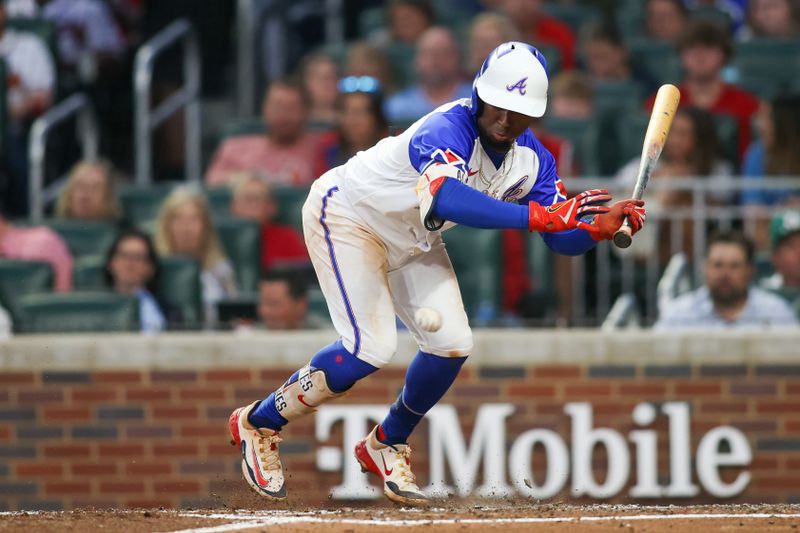 May 6, 2023; Atlanta, Georgia, USA; Atlanta Braves second baseman Ozzie Albies (1) gets out of the way of a pitch against the Baltimore Orioles in the fourth inning at Truist Park. Mandatory Credit: Brett Davis-USA TODAY Sports
