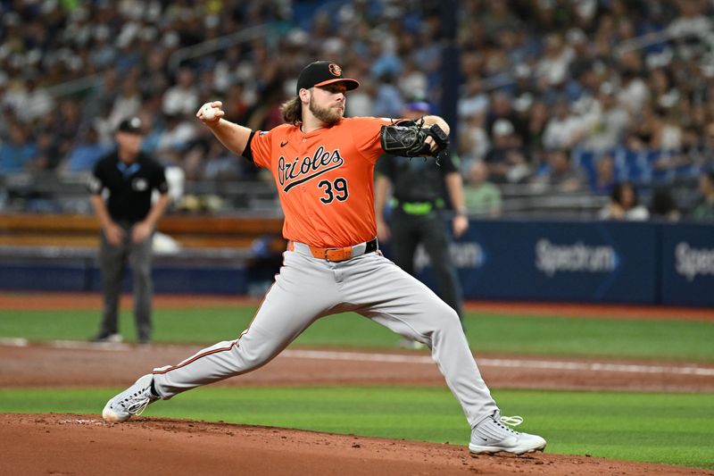 Aug 10, 2024; St. Petersburg, Florida, USA; Baltimore Orioles starting pitcher Corbin Burnes (39) throws a pitch in the first inning against the Tampa Bay Rays at Tropicana Field. Mandatory Credit: Jonathan Dyer-USA TODAY Sports