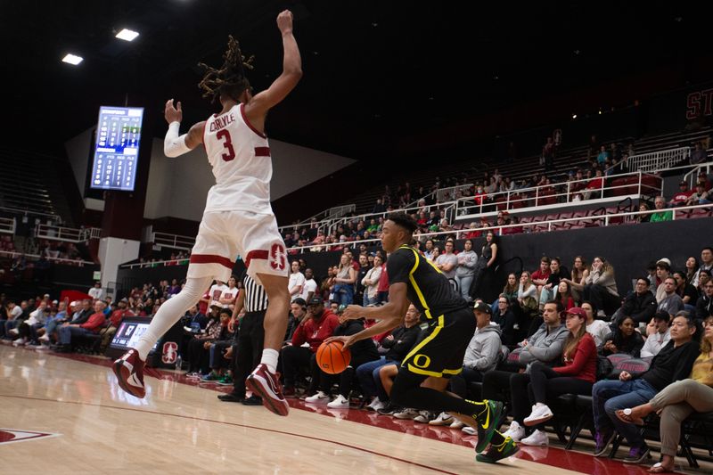 Feb 22, 2024; Stanford, California, USA; Oregon Ducks forward Kwame Evans Jr. (10) drives around Stanford Cardinal guard Kanaan Carlyle (3) during the second half at Maples Pavilion. Mandatory Credit: D. Ross Cameron-USA TODAY Sports